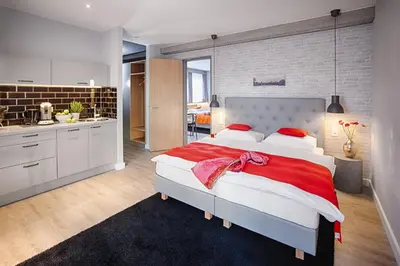 Ein Bett oder Betten in einem Zimmer der Unterkunft MLOFT Apartments München