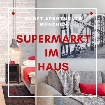 Ein Bett oder Betten in einem Zimmer der Unterkunft MLOFT Apartments München
