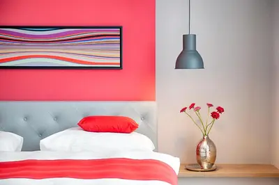 Ein Bett oder Betten in einem Zimmer der Unterkunft MLOFT Apartments München