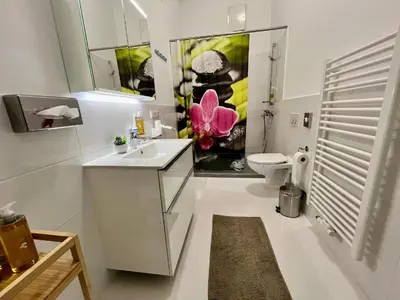 Ein Badezimmer in der Unterkunft Adlzreiter City Pension