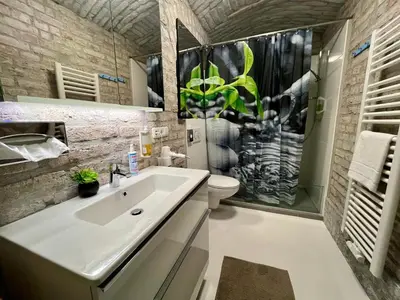 Ein Badezimmer in der Unterkunft Adlzreiter City Pension