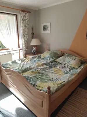 Ein Bett oder Betten in einem Zimmer der Unterkunft FeWo Garmisch
