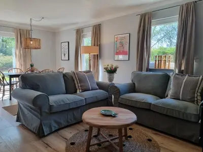 Ein Sitzbereich in der Unterkunft Boutique Ferienhaus Chiemsee