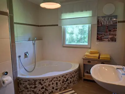 Ein Badezimmer in der Unterkunft Boutique Ferienhaus Chiemsee