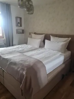 Ein Bett oder Betten in einem Zimmer der Unterkunft Apartment Bergliebe