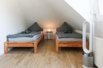 Ein Bett oder Betten in einem Zimmer der Unterkunft DreamStay Augsburg Traum Penthouse Göggingen