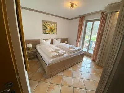 Ein Bett oder Betten in einem Zimmer der Unterkunft Alpspitzblick