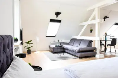 Ein Sitzbereich in der Unterkunft stycoz - Modernes Loft - 60 m2 - Küche - Parken
