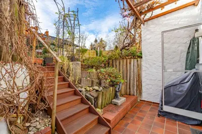 Ein Garten an der Unterkunft Ferienwohnungen Christoph in der Edelweißstraße