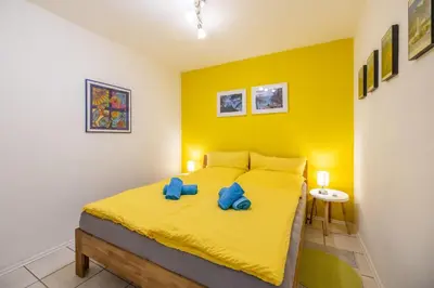 Ein Bett oder Betten in einem Zimmer der Unterkunft Ferienwohnungen Christoph in der Edelweißstraße