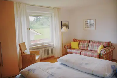 Ein Bett oder Betten in einem Zimmer der Unterkunft Ferienwohnung Wallner