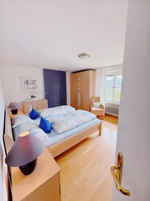 Ein Bett oder Betten in einem Zimmer der Unterkunft Ferienwohnung Wallner