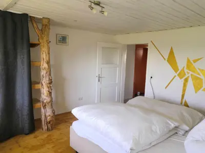 Ein Bett oder Betten in einem Zimmer der Unterkunft Sonnenhaus