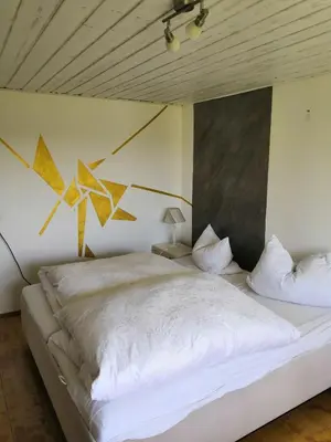 Ein Bett oder Betten in einem Zimmer der Unterkunft Sonnenhaus