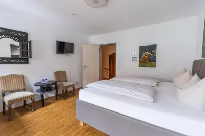 Ein Bett oder Betten in einem Zimmer der Unterkunft Hotel Freischütz
