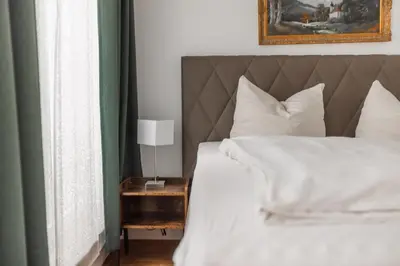 Ein Bett oder Betten in einem Zimmer der Unterkunft Hotel Freischütz