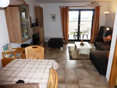 Ein Sitzbereich in der Unterkunft Ferienhaus Nr 106, Kategorie Premium, Feriendorf Hochbergle, Allgäu