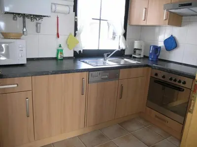 Küche/Küchenzeile in der Unterkunft Ferienhaus Nr 106, Kategorie Premium, Feriendorf Hochbergle, Allgäu