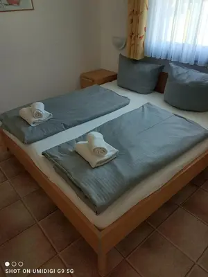 Ein Bett oder Betten in einem Zimmer der Unterkunft Ferienhaus Nr 106, Kategorie Premium, Feriendorf Hochbergle, Allgäu