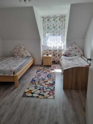 Ein Bett oder Betten in einem Zimmer der Unterkunft Monteurwohnung Weigl