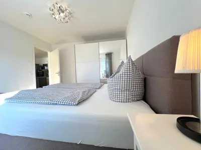 Ein Bett oder Betten in einem Zimmer der Unterkunft Bergblick