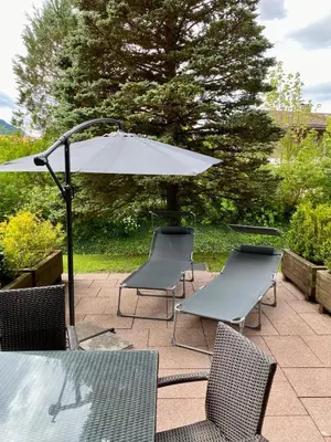 Ein Garten an der Unterkunft FeWo Rottachbrücke