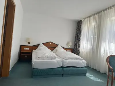 Ein Bett oder Betten in einem Zimmer der Unterkunft ST Hotel