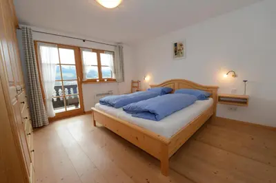 Ein Bett oder Betten in einem Zimmer der Unterkunft Summererhof Hausham
