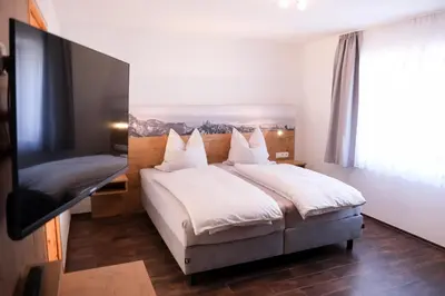 Ein Bett oder Betten in einem Zimmer der Unterkunft Ferienwohnung beim Binder