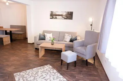 Ein Sitzbereich in der Unterkunft Ferienwohnung beim Binder