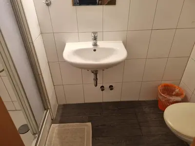 Ein Badezimmer in der Unterkunft Pension Inntalhof