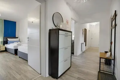 Ein Bett oder Betten in einem Zimmer der Unterkunft KATIES Apartments Augsburg - Zentral - 4 Zimmer - 7 Personen - 2 Parken - Nintendo Switch - DisneyPlus - E-Kamin