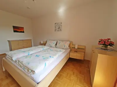 Ein Bett oder Betten in einem Zimmer der Unterkunft Ferienwohnungen Eibl