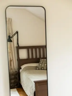 Ein Bett oder Betten in einem Zimmer der Unterkunft Ferienhaus Flying Roots Wackersberg
