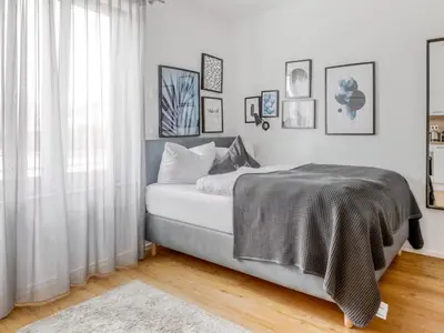 Ein Bett oder Betten in einem Zimmer der Unterkunft My Suite - Augsburg City - Netflix