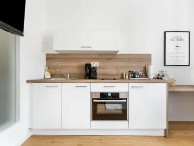 Küche/Küchenzeile in der Unterkunft My Suite - Augsburg City - Netflix