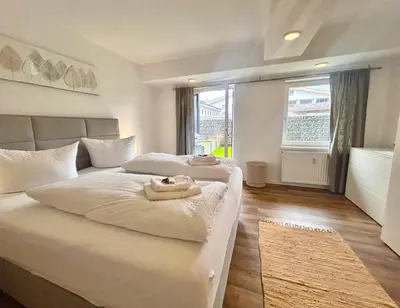 Ein Bett oder Betten in einem Zimmer der Unterkunft Ferienwohnung 