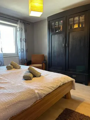 Ein Bett oder Betten in einem Zimmer der Unterkunft Ferienwohnung Casa de Mane&Tina mit Gartenmitbenutzung