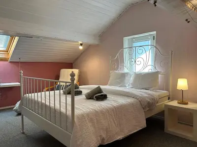 Ein Bett oder Betten in einem Zimmer der Unterkunft Ferienwohnung Casa de Mane&Tina mit Gartenmitbenutzung