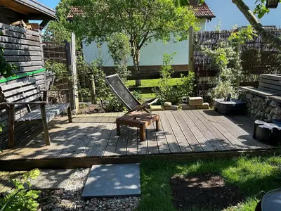 Ein Garten an der Unterkunft Ferienwohnung Casa de Mane&Tina mit Gartenmitbenutzung