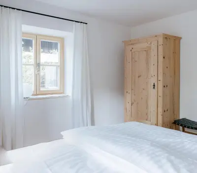 Ein Bett oder Betten in einem Zimmer der Unterkunft Haus Herzogstand - Ferienwohnungen in Kochel am See
