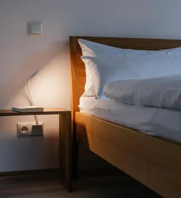 Ein Bett oder Betten in einem Zimmer der Unterkunft Haus Herzogstand - Ferienwohnungen in Kochel am See