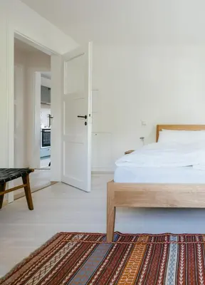 Ein Bett oder Betten in einem Zimmer der Unterkunft Haus Herzogstand - Ferienwohnungen in Kochel am See