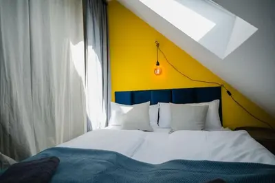 Ein Bett oder Betten in einem Zimmer der Unterkunft Lake house with sun terrace for 8 guests