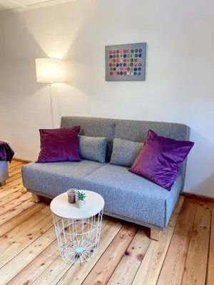 Ein Sitzbereich in der Unterkunft Belisima Apartments I Ferienwohnungen Fischbachau - Schliersee I Historisch & Cozy mit Bergblick I 2 Schlafzimmer