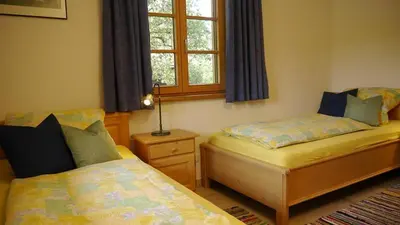 Ein Bett oder Betten in einem Zimmer der Unterkunft Ferienwohnung Schmidhof