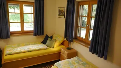 Ein Bett oder Betten in einem Zimmer der Unterkunft Ferienwohnung Schmidhof