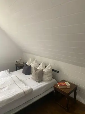 Ein Bett oder Betten in einem Zimmer der Unterkunft Haus am Kuhsee