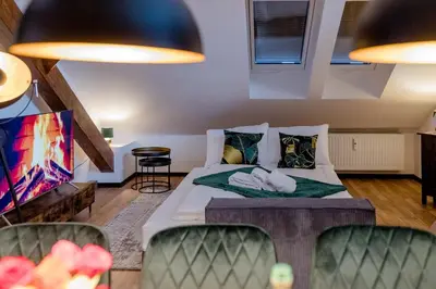 Ein Bett oder Betten in einem Zimmer der Unterkunft UNiQE I 115qm I 3 Schlafzimmer I Nähe Messe