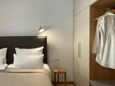 Ein Bett oder Betten in einem Zimmer der Unterkunft Ferienwohnung h9 Tal mit Sauna und Bergblick